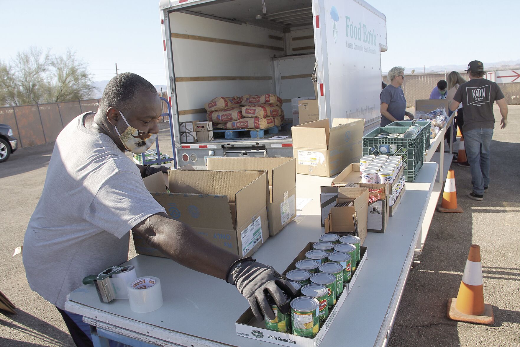 Food Bank: Putting together Thanksgiving dinners